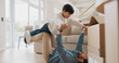 © ChasingMagic25/peopleimages.com - Moving, son and father playing airplane in new home, real estate and happy bonding in family house. Lounge, property investment and man lifting child in air, flying game and connection for support
