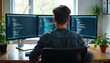 © Viktor - Man types code on multiple computer screens. Programmer works on website development project. He uses desktop setup for app coding and task management.