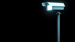 © Kittayawan - Glowing security camera stands tall against dark background, symbolizing safety and surveillance