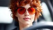 © michnik101 - Confident Woman With Short Red Hair And Red Sunglasses Sitting In Car. Fashion Look, Modern Auto Travel And Lifestyle Visual