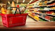 © Lilimanatasa - grocery store, shelves, a red shopping basket, and a blurry background