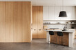 © ImageFlow - Modern minimalist kitchen interior with wooden cabinets, neutral tones, and island seating concept in clean contemporary design style. 3D Rendering