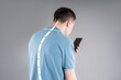 © staras - Man with neck pain from using smartphone, text neck and bad posture concept