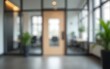 © li - Blurry office interior with blurred door modern workspace calm environment business concept. High quality