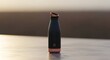 © Top_Stock - Sleek Matte Black Water Bottle With Copper Accents