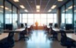 © wang - Blurred image of spacious open-plan office with desks and ceiling lights Soft focus creating abstract view of modern workspace interior. High quality