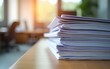 © wu - Close-Up View of Stacked Document Papers with Soft Focus and Warm Lighting in an Office Environment for Office Use and Organization Purposes. High quality