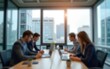 © gu - Blurred background of a modern office interior with blurred business people working in a team at a table. High quality
