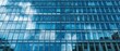 © Artinun - Abstract office building facade with blue tinted glass panels. Corporate architecture concept modern business facility commercial workplace design for urban office environment professional background.