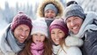 © mila103 - Five people gather outdoors on a snowy day, sharing happy moments together in warm hats and scarves. Their smiles show the joy of winter fun and togetherness.