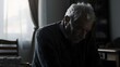 © Agus Sriyanto - Elderly man sitting alone in quiet room reflecting on life symbolizing mental wellness aging loneliness and emotional awareness in older adults. Mental health and wellbeing concept