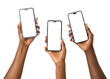 © STRM DESIGNER - Three hands holding up smartphones with black screens against a dark background