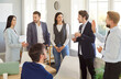 © Studio Romantic - Diverse business team conducting a presentation and report during an office meeting with colleagues. Professional people gathering focuses on training, teamwork, and productive work.