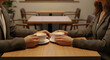© Roman Stock studio - Man and woman holding coffee cups while sitting at a table indoors
