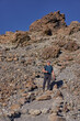 © Xalanx - Man with action camera hiking on a volcanic trail in Tenerife