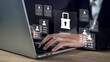 © The KonG - Management confidentiality and employee verification concept with businessman using laptop, reviewing secure digital documents and protected user data in a confidential business system interface.