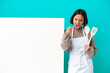 © luismolinero - Young mixed race cook woman with a big placard isolated on blue background frustrated and pointing to the front
