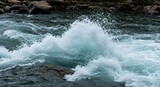 A powerful rush of foamy whitewater churns over submerged rocks, showcasing the raw, untamed force of nature in dynamic motion ,liquid ,wild ,foam