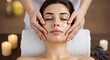 © ms25designs - Woman receiving relaxing facial massage with oil