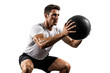 © AuroraCrafts - Athletic man performing a squat with a medicine ball during a workout