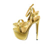 © nd700 - gold color platform high heels isolated on white background
