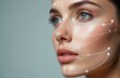 © Vadym - Young woman face displays virtual lines. Digital tech maps facial features for precise beauty analysis, cosmetic planning. Tech guides aesthetic treatment, dermatology, plastic surgery. Focus on skin