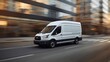 © Imagine  - Modern delivery van driving through a busy city street at golden hour, illustrating urban transportation, commercial logistics, efficient mobility, and fast professional service in a dynamic metropoli