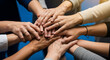 © Andres Mejia - Group of diverse hands creating teamwork and unity