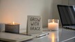 © nashwa - Inspirational Workspace with Candles and 'Grow with Grace' Sign for Motivation and Productivity Enhancement