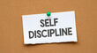 © creative - Self discipline is standing on a paper, improvement by education, willpower to reach goals