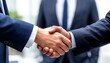 © NK_Media - Business professionals shaking hands, sealing a successful agreement, partnership, collaboration, and deal completion in corporate setting, showing teamwork and trust of Western and African countries