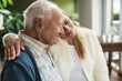 © Westend61 - Woman embracing father and spending time together at home