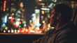 © HISTOCK - Man contemplating city lights from car window on a rainy night