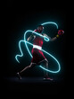© Lustre Art Group  - Professional boxer in red gloves throwing punch with bright neon energy trail in dark studio. Concept of sports motivation, gym campaign, and fitness performance branding.