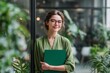 © Khawla - Smiling Businesswoman in Modern Office with Green Plants