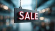 © Lazartivan - Three Dimensional Red Sale Letters on Black Hanging Sign with Chain Links
