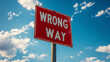 © Faizan - Warning sign alerts drivers of wrong way ahead on a bright sunny day