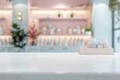 © NikoG - Cosmetic bottles on a white table in a beauty store