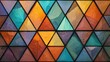 © Alina Art Works - A colorful stained glass window with triangular panes in various shades and textures creating a mosaic
