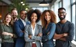 © yuan - Smiling group of confident diverse and modern business people, standing, arms crossed with leadership quality. Professional team of work colleagues proud with unity together in modern office