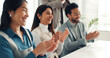 © peopleimages.com - Happy, business people and meeting with applause for presentation, thank you or well done in office. Group, employees or team clapping with smile for conference, speech or workshop in workplace