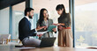 © BuyOutFelix04/peopleimages.com - Collaboration, project management and tablet with business people in office for plan development. App, laptop and meeting with corporate employee team in boardroom at work for discussion or research