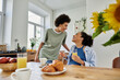 © Bliss - Happy couple enjoying quality time together in a cozy modern apartment