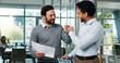 © PeakCC/peopleimages.com - Review, graphs or men in office with fist bump, investment opportunity or collaboration for cost report. Happy, partnership or analyst in agency with tech, profit or revenue growth in budget update.