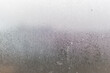 © Angelov - Water droplets condensation background of dew on glass, humidity and foggy blank. Outside, bad weather, rain