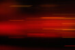 © mod - Abstract red and orange streaks across a dark background creating a sense of speed and motion blur