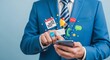 © Muddasar - A businessman in a blue suit interacts with a smartphone, visual notifications emerging around him.