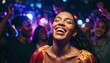© Lightning - Young black woman laughing joyfully while dancing in a vibrant nightclub with colorful lights.
