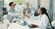 © BuyOutFelix05/peopleimages.com - Business people, meeting or hiring with handshake, applause or thank you for onboarding in office. Businessman, woman or colleagues shaking hands with deal for b2b, agreement or recruitment process