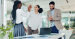 © Davids25/peopleimages.com - Business, laptop or team with high five celebration for investment return, KPI performance or success. Financial analyst, happy people or applause in office for risk mitigation or finance opportunity
